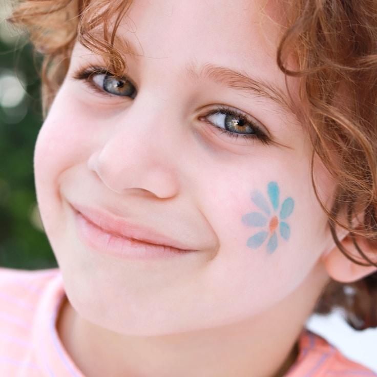 Asha Rao, Lead Design Curator at Nova Celestia, reviewing corporate floral arrangements